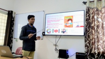 A trainee making a presentation